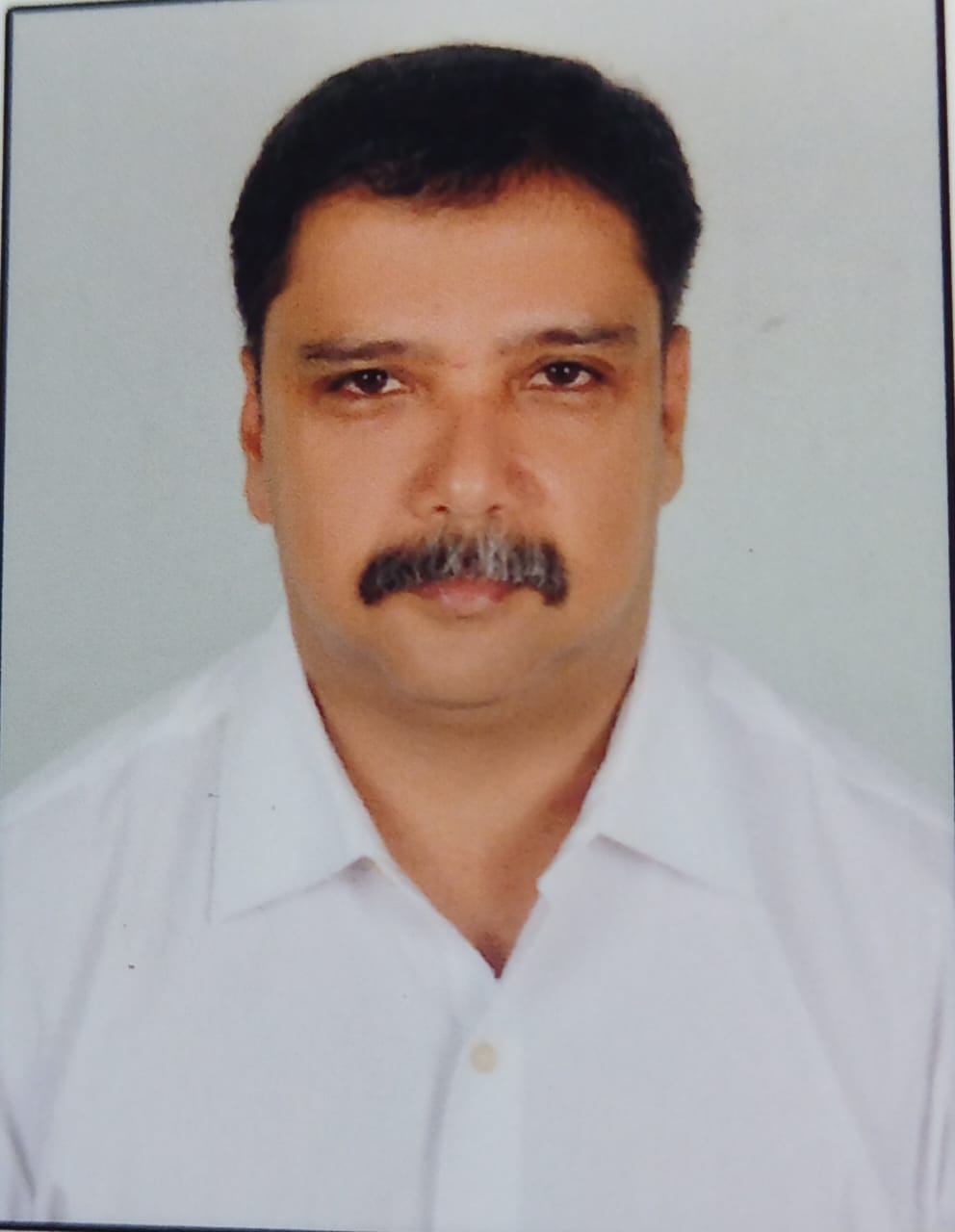 Adv. Thomas A John